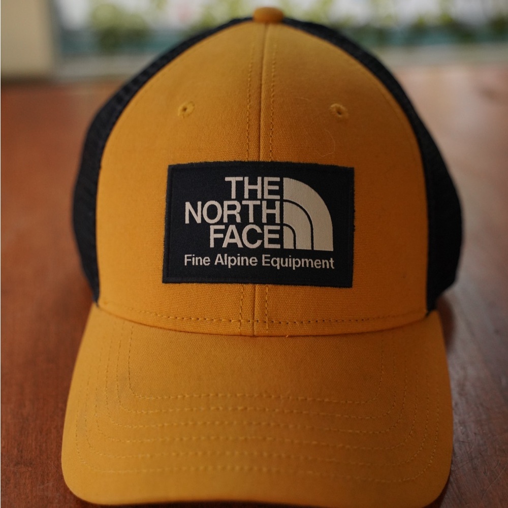 The North Face Yellow and Black Trucker Hat